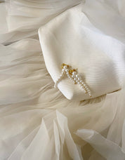 Parel oorbellen van Les Meres met gouden detail