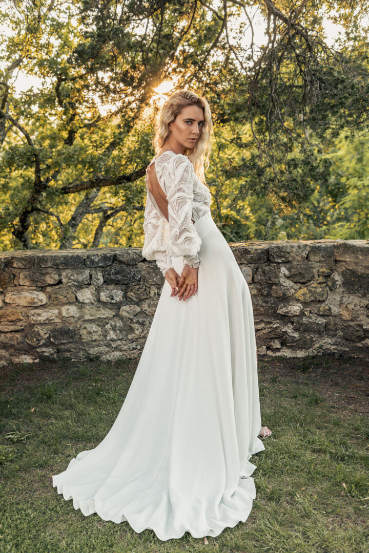 Muse romantische trouwjurk met lange mouwen van Caroline Takvorian
