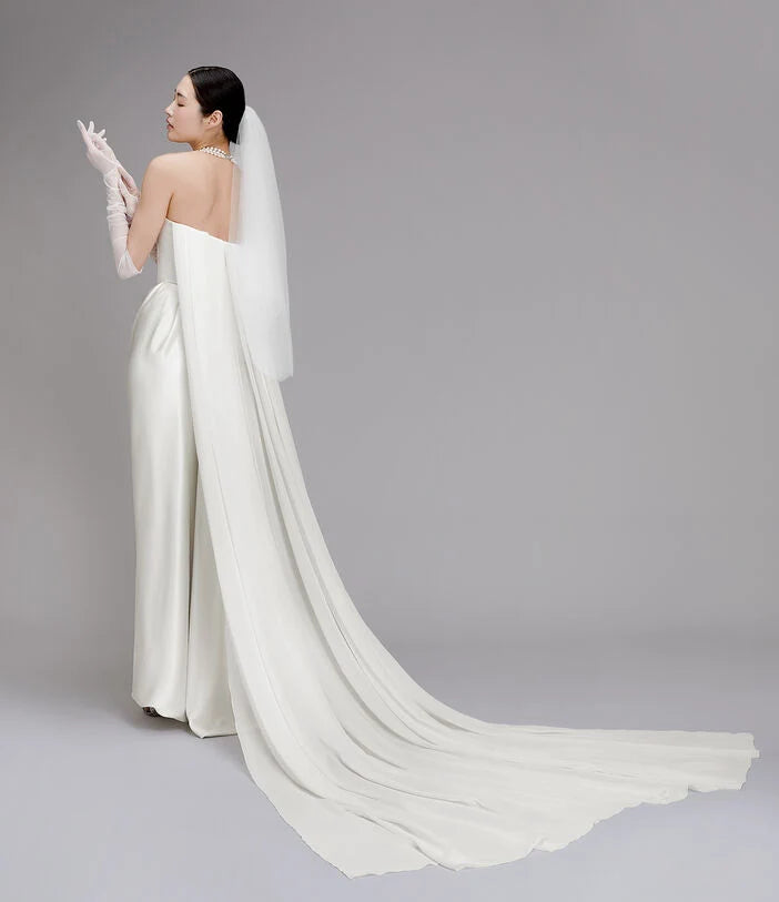 GalaxyCape_VivienneWestwood_Weddingdress_WildAtHeartBridal_681dbcf8-32ce-4eed-989e-78b0b38dbdb9.webp